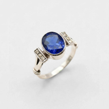 Created Sapphire Ring made in 925 Sterling Silver with Baguette Created Blue Sapphire in Bezel setting, September Birthstone gift idea, symbolizes sincerity, truth, and faithfulness, ideal for everyday wear and perfect for birthday gifting and special occasions.