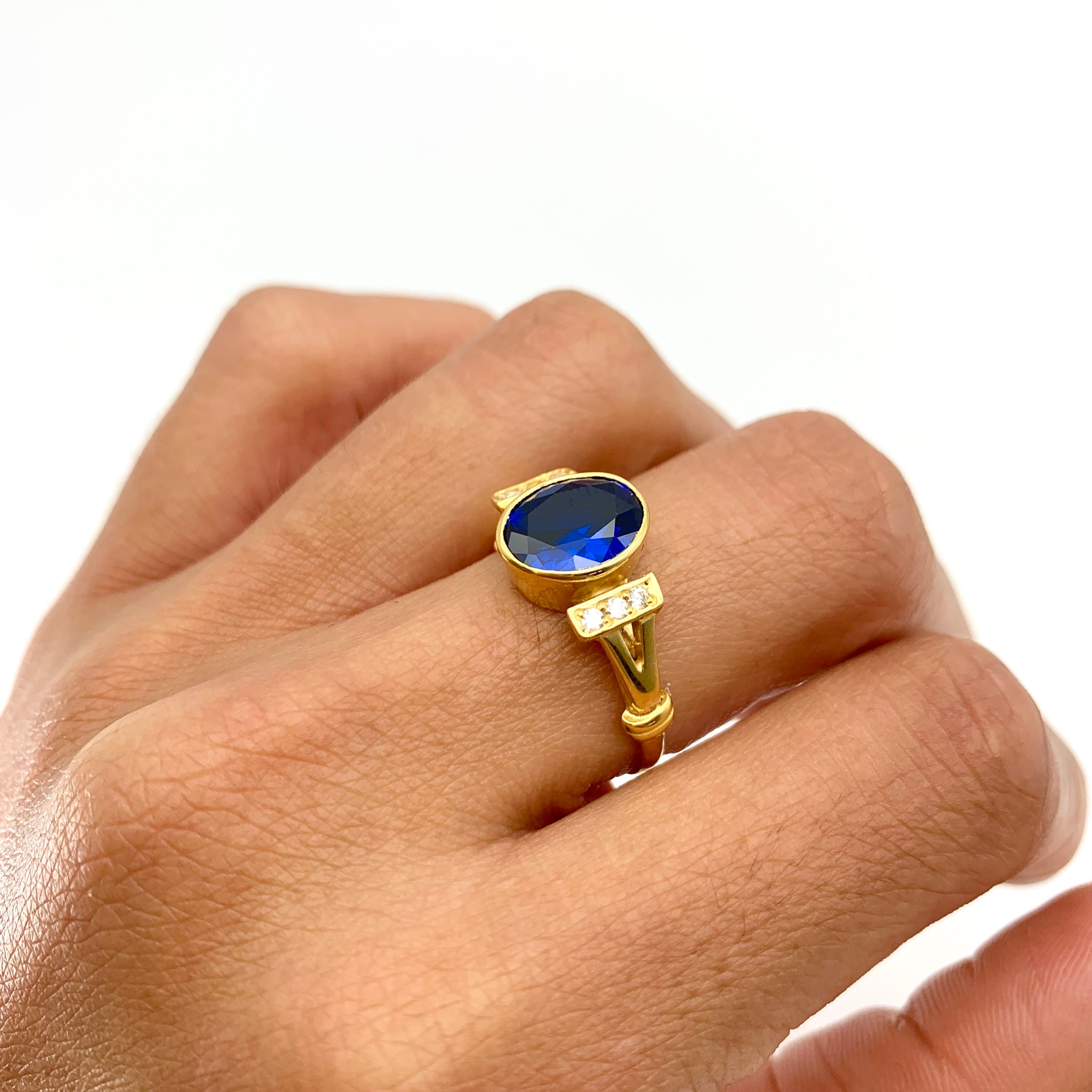 Elegant 18k Gold Vermeil ring featuring an Oval Created Blue Sapphire, perfect for September birthdays and special occasions.