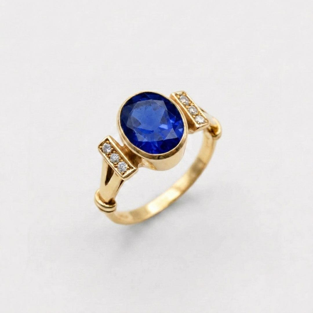 Created Sapphire Ring made in 18k Gold Vermeil with Oval Created Blue Sapphire in Bezel setting, September Birthstone gift idea, symbolizes sincerity, truth, and faithfulness, ideal for everyday wear and perfect for birthday gifting and special occasions.