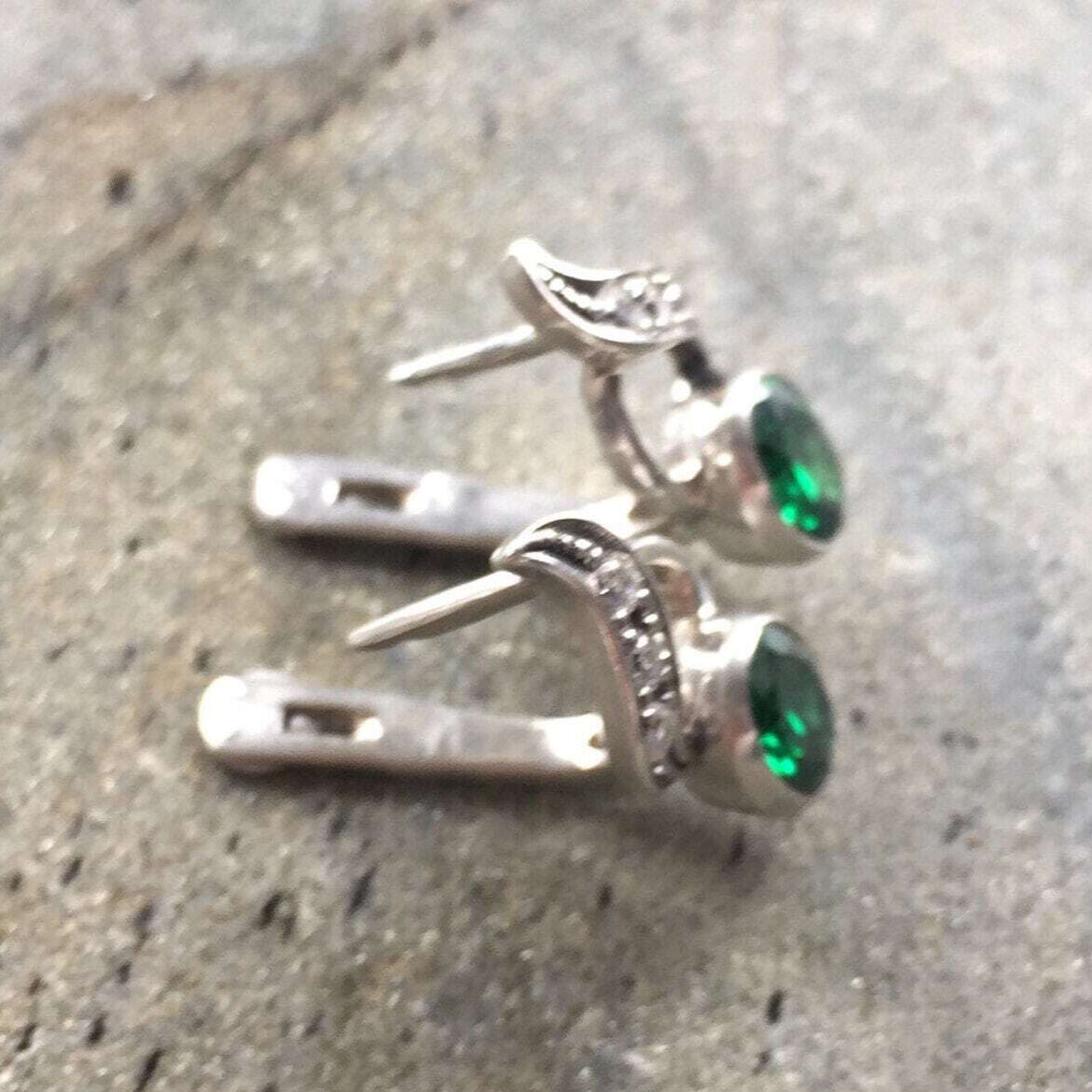 Stunning 18k Gold Vermeil Earrings with Oval Created Green Emeralds; a perfect blend of luxury and meaningful gifting for May birthdays.
