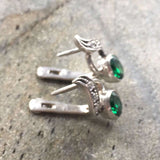 Stunning 18k Gold Vermeil Earrings with Oval Created Green Emeralds; a perfect blend of luxury and meaningful gifting for May birthdays.