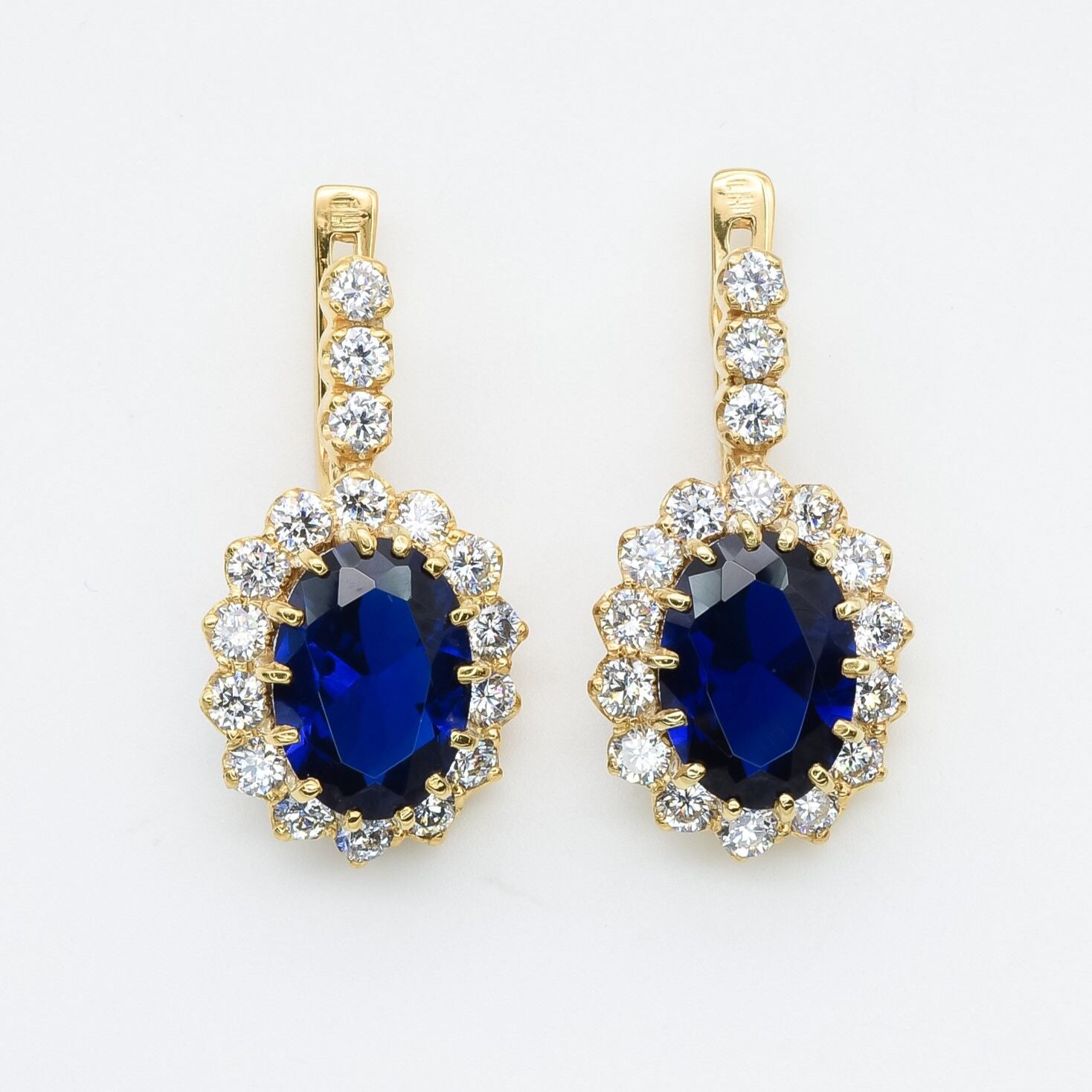 Created Sapphire Earrings made in 18k Gold Vermeil with Pear Created Blue Sapphire in Halo setting, September Birthstone gift idea, symbolizes sincerity, truth, and faithfulness, ideal for everyday wear and perfect for birthday gifting and special occasions.
