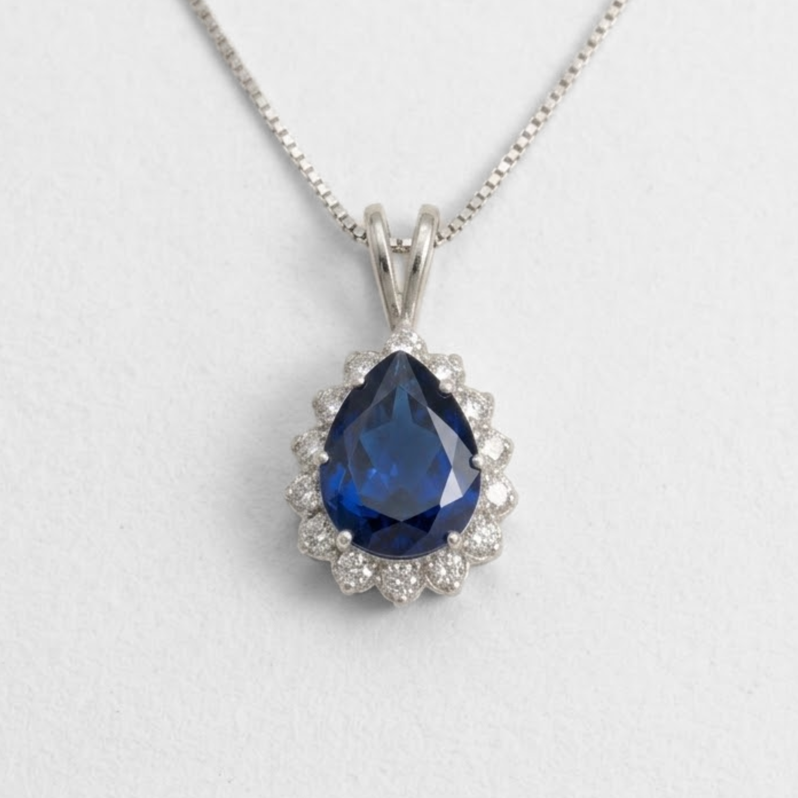 Created Sapphire Pendant made in 925 Sterling Silver with Pear Created Blue Sapphire in Prong setting, September Birthstone gift idea, symbolizes sincerity, truth, and faithfulness, ideal for everyday wear and perfect for birthday gifting and special occasions.