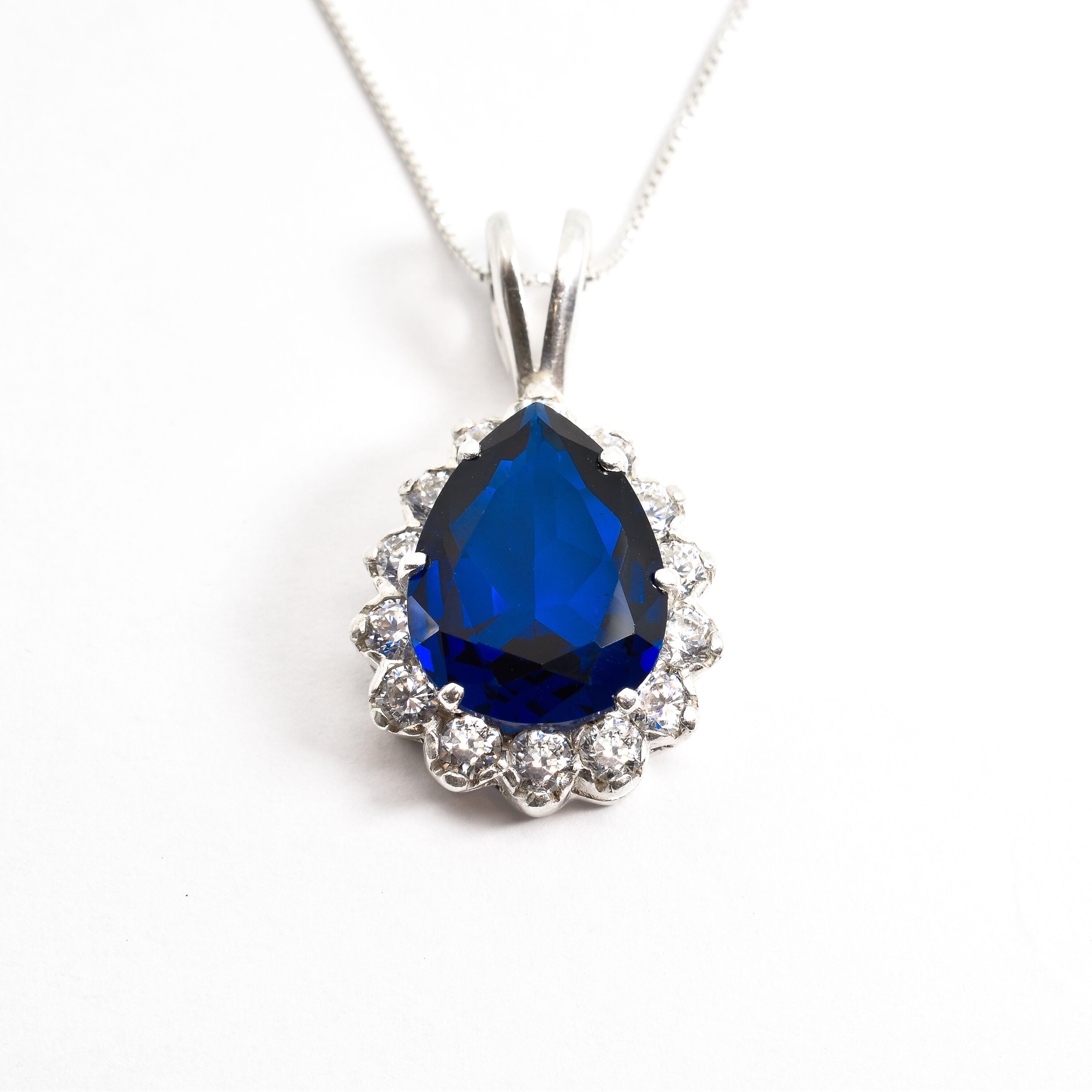 Created Sapphire Pendant made in 925 Sterling Silver with Pear Created Blue Sapphire in Prong setting, September Birthstone gift idea, symbolizes sincerity, truth, and faithfulness, ideal for everyday wear and perfect for birthday gifting and special occasions.
