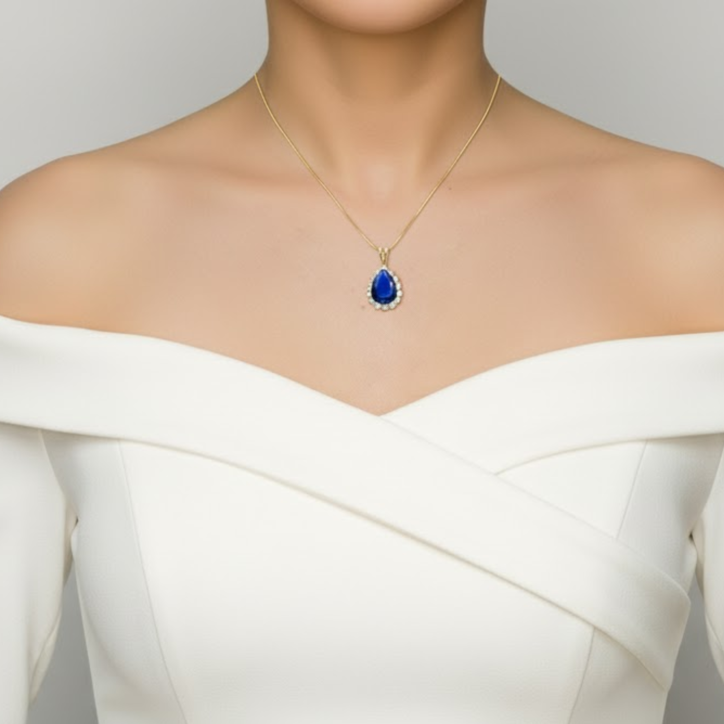 Elegant 18k Gold Vermeil Sapphire Pendant featuring a pear-shaped Created Blue Sapphire, perfect for birthdays and special occasions.