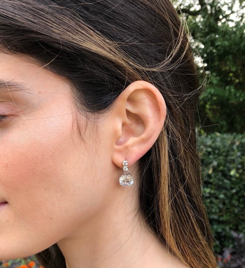 Emerald earrings in 925 Sterling Silver, featuring created green emeralds, perfect birthday gift for May celebrations.