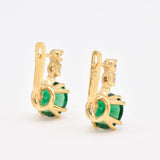 Chic 18k Gold Vermeil Earrings showcasing a vibrant created green emerald, perfect for birthdays and everyday elegance.