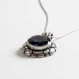 Stylish created blue sapphire pendant in 925 sterling silver, perfect September birthstone gift for any celebration or daily elegance.