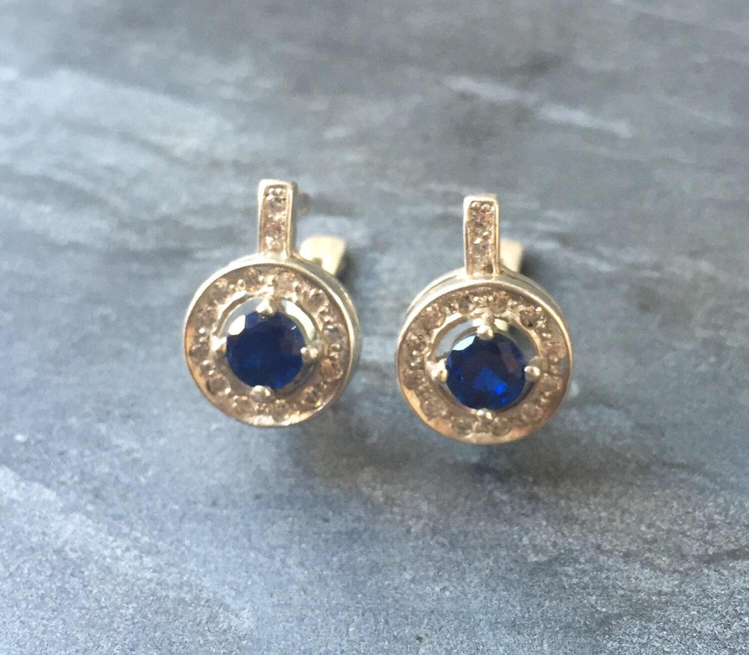Created Sapphire Earrings made in 925 Sterling Silver with Round Created Blue Sapphire in Halo setting, September Birthstone gift idea, symbolizes sincerity, truth, and faithfulness, ideal for everyday wear and perfect for birthday gifting and special occasions.