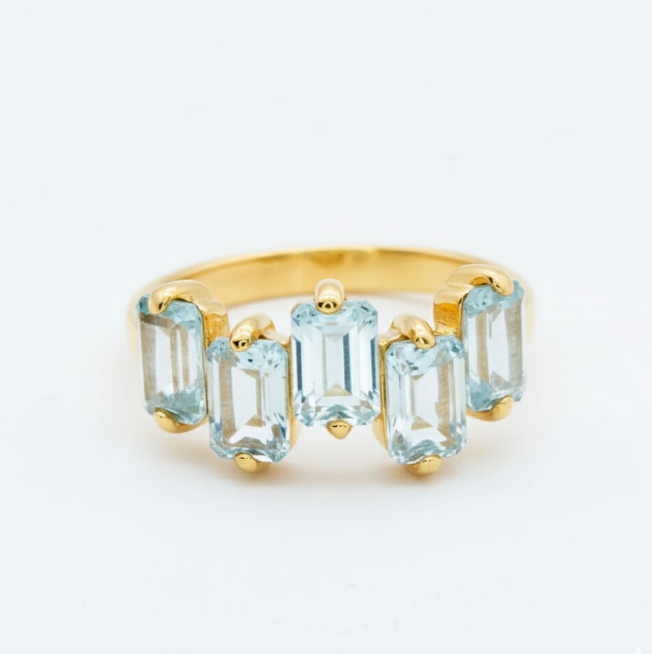 Elegant 18k Gold Vermeil Blue Topaz Ring with cluster design, ideal December birthstone gift, represents clarity and emotional balance.