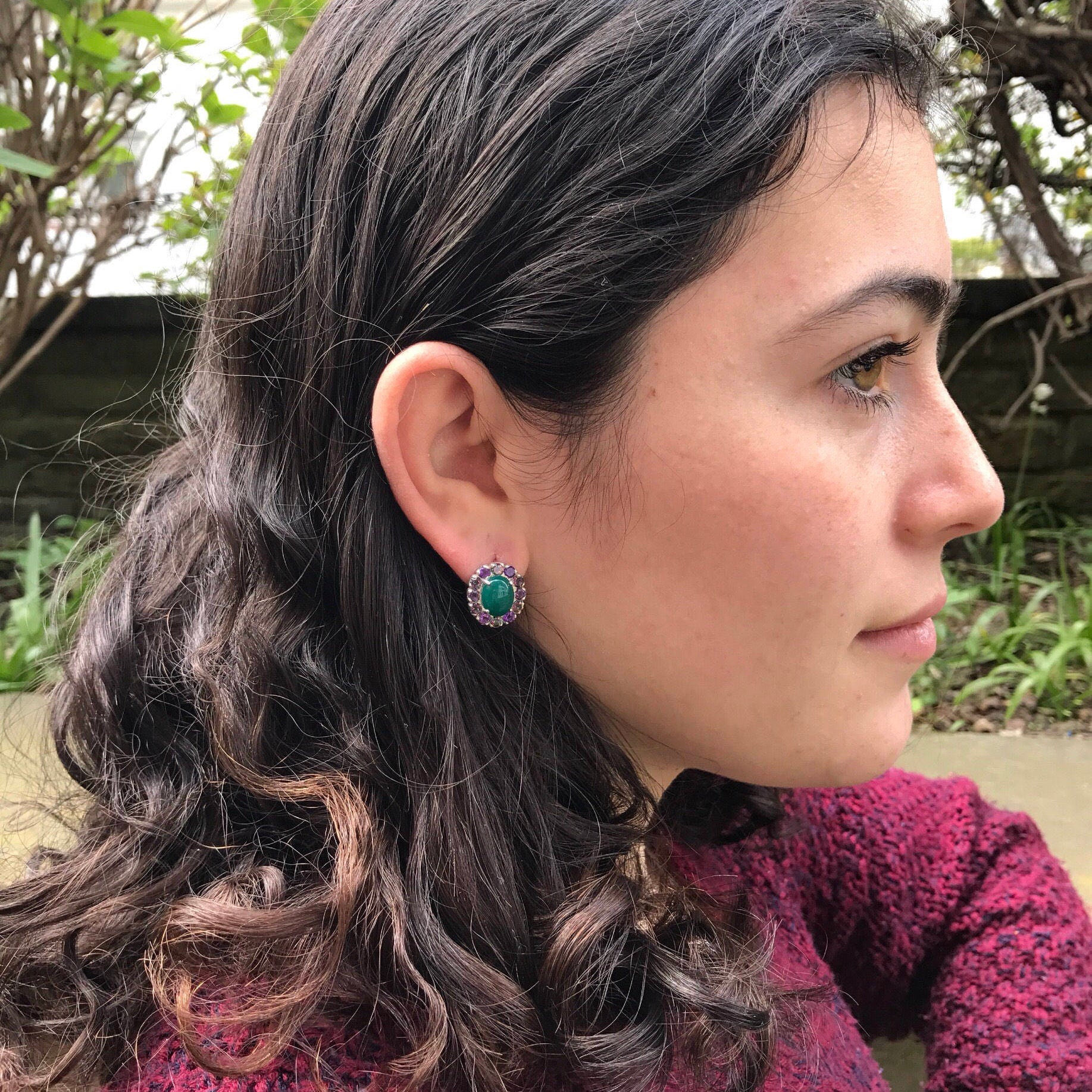 Sterling Silver Emerald Halo Earrings, crafted with oval green created emeralds; perfect for birthdays and special occasions.