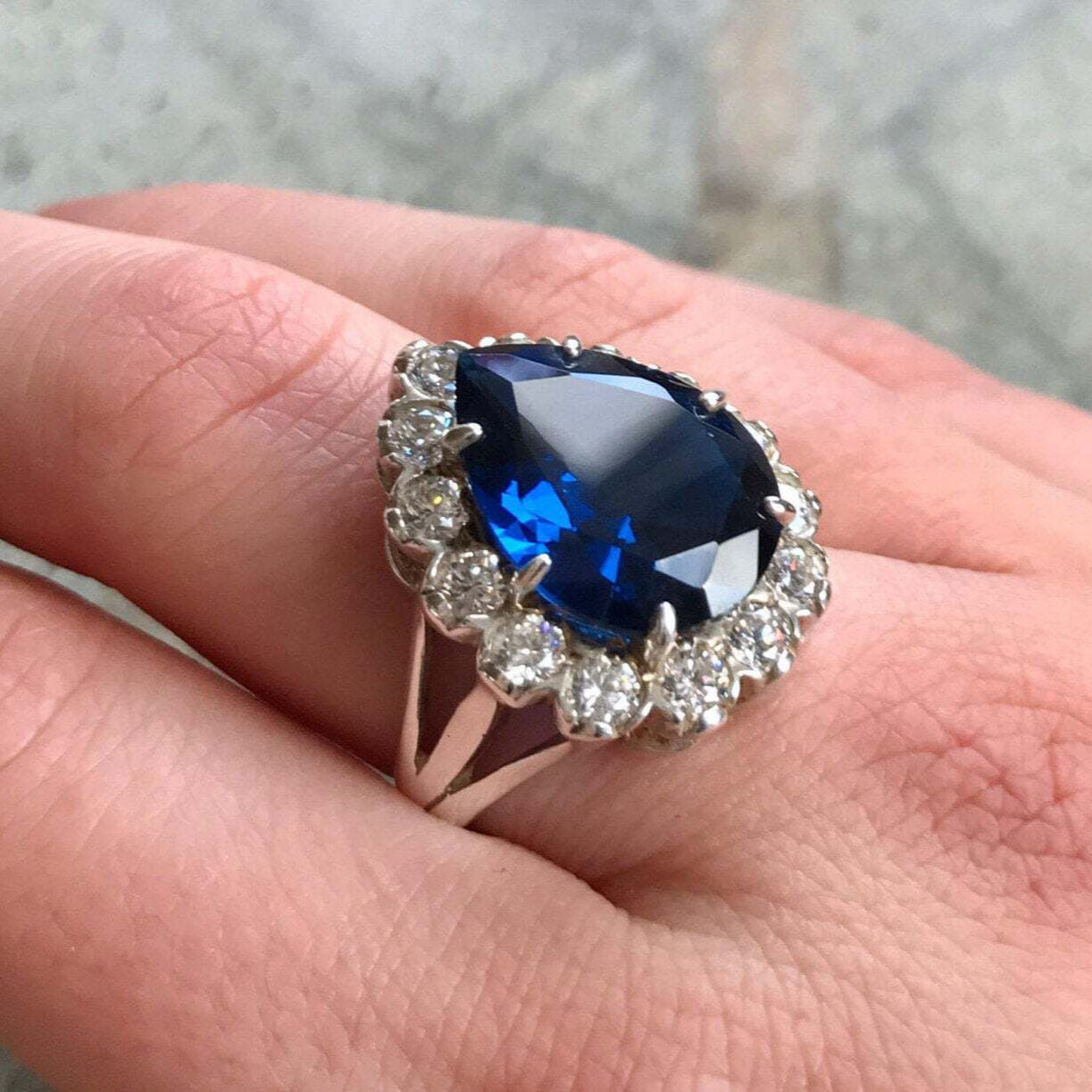 Elegant 925 Sterling Silver ring with Pear Created Blue Sapphire, ideal September birthday gift symbolizing sincerity and faithfulness.
