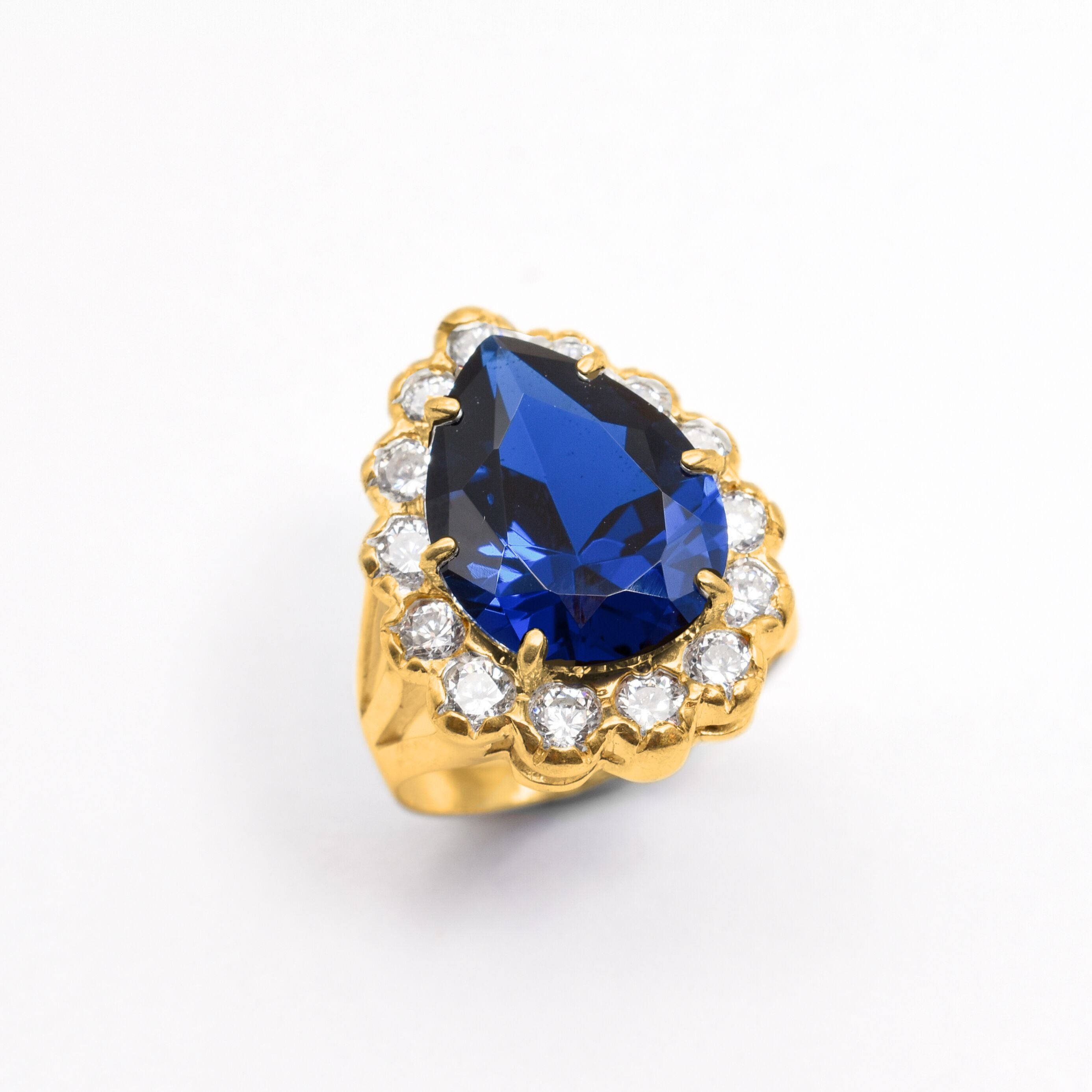 Created Sapphire Ring made in 18k Gold Vermeil with Pear Created Blue Sapphire in Prong setting, September Birthstone gift idea, symbolizes sincerity, truth, and faithfulness, ideal for everyday wear and perfect for birthday gifting and special occasions.