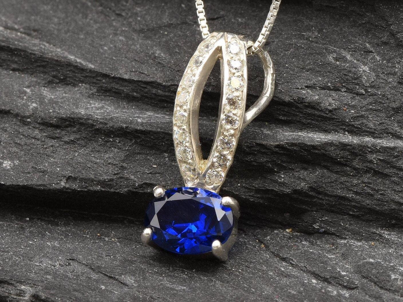 Created Sapphire Pendant made in 925 Sterling Silver with Oval Created Blue Sapphire in Prong setting, September Birthstone gift idea, symbolizes sincerity, truth, and faithfulness, ideal for everyday wear and perfect for birthday gifting and special occasions.