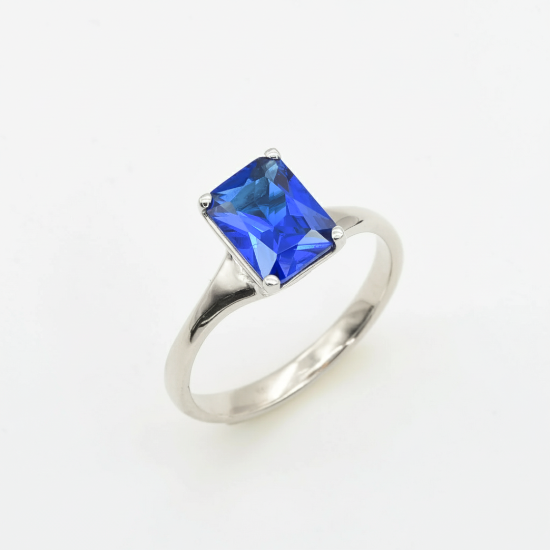 Created Sapphire Ring made in 925 Sterling Silver with Baguette Created Blue Sapphire in Solitaire setting, September Birthstone gift idea, symbolizes sincerity, truth, and faithfulness, ideal for everyday wear and perfect for birthday gifting and special occasions.