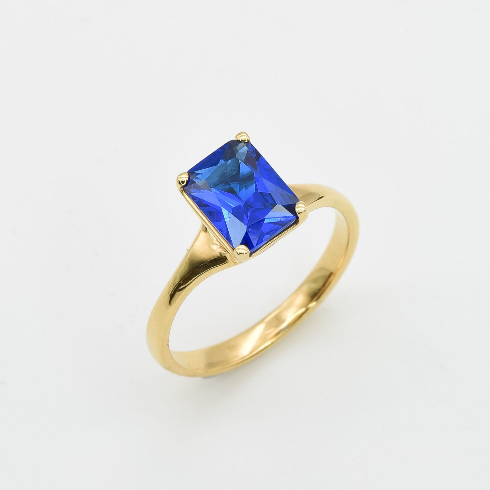 Created Sapphire Ring made in 18k Gold Vermeil with Baguette Created Blue Sapphire in Solitaire setting, September Birthstone gift idea, symbolizes sincerity, truth, and faithfulness, ideal for everyday wear and perfect for birthday gifting and special occasions.