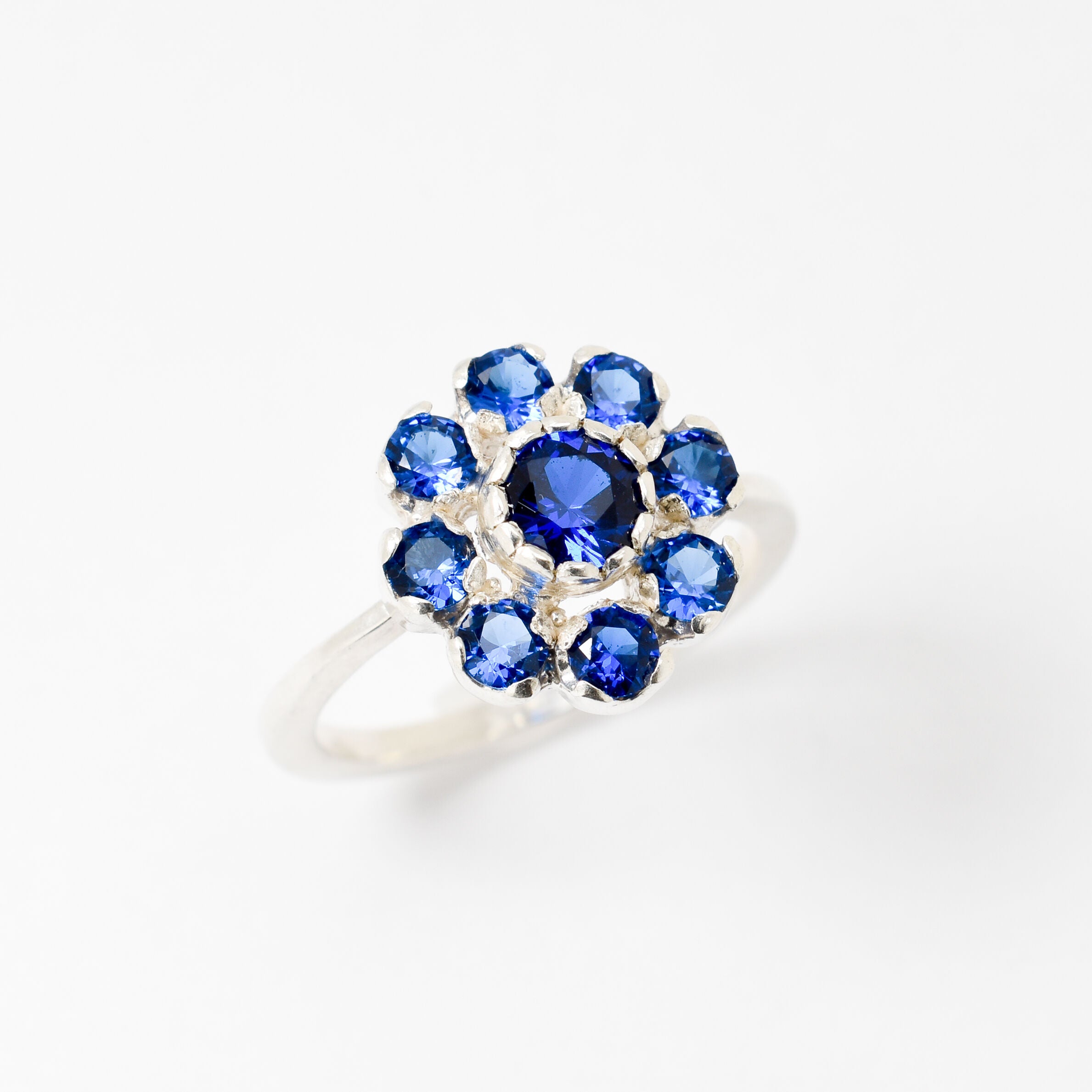 Created Sapphire Ring made in 925 Sterling Silver with Round Created Blue Sapphire in Cluster setting, September Birthstone gift idea, symbolizes sincerity, truth, and faithfulness, ideal for everyday wear and perfect for birthday gifting and special occasions.