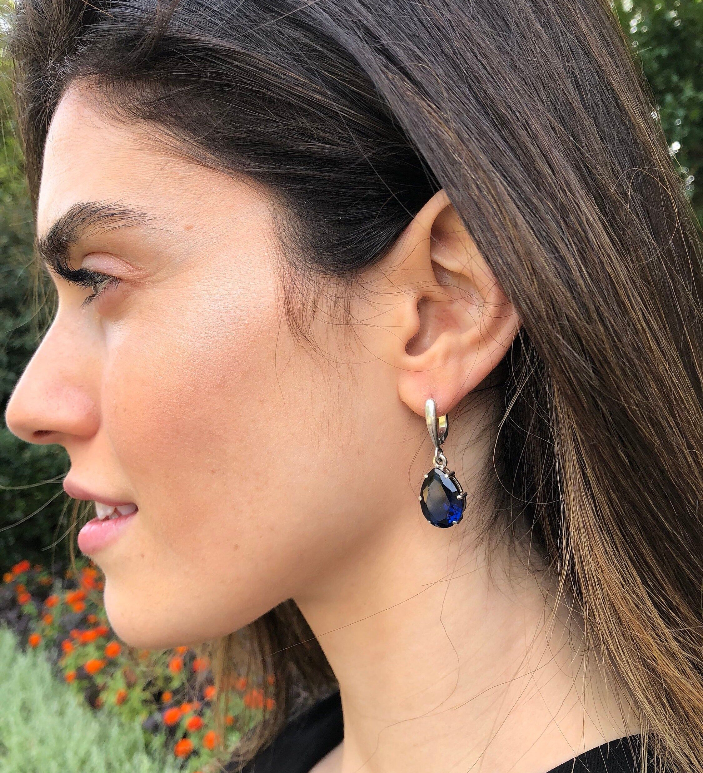 Sapphire earrings in 925 sterling silver, featuring prong-set blue sapphires, perfect for daily wear and special occasions.