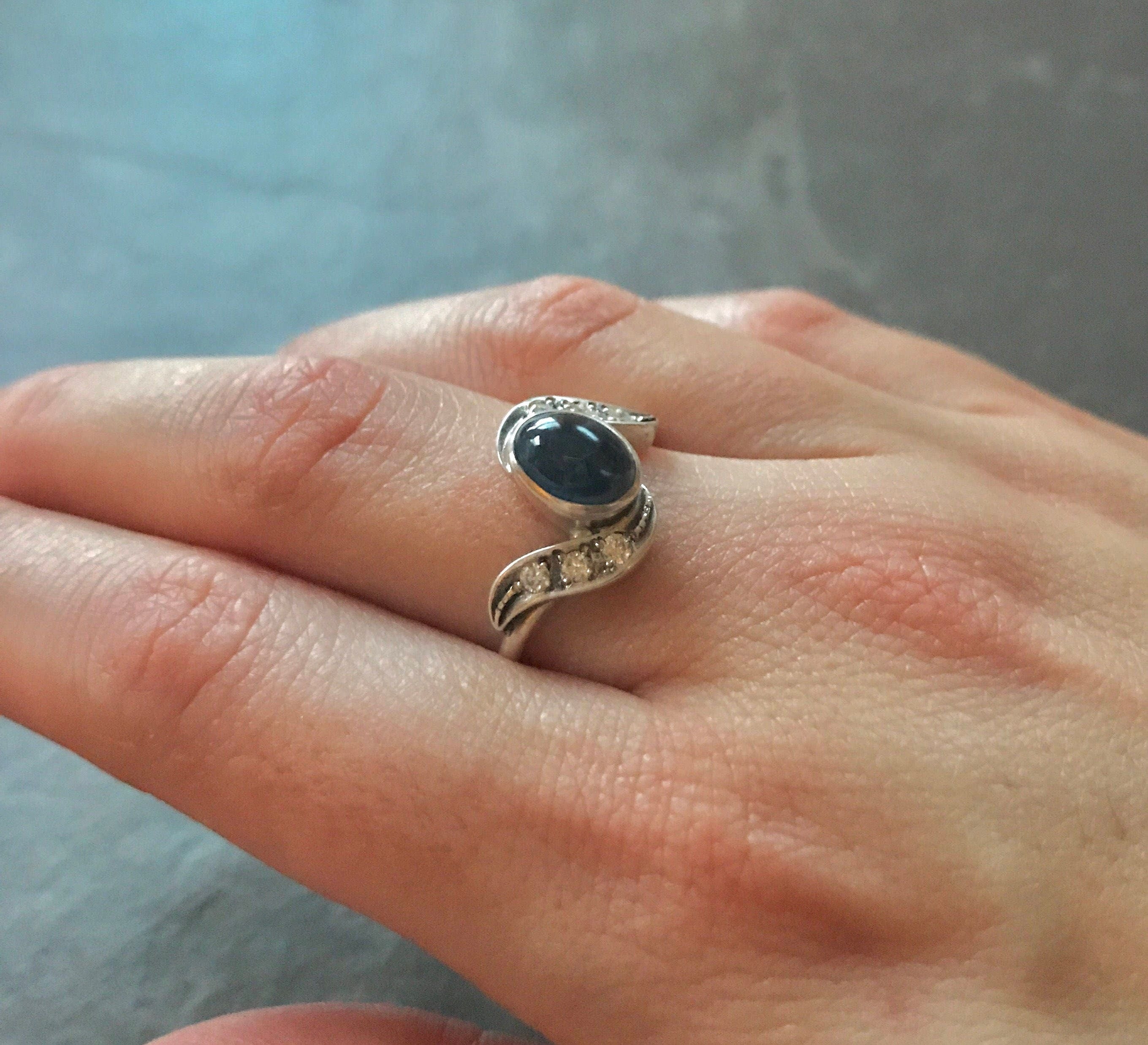 Elegant 925 Sterling Silver ring featuring an Oval Blue Sapphire, perfect for birthdays and symbolizing sincerity and faithfulness.