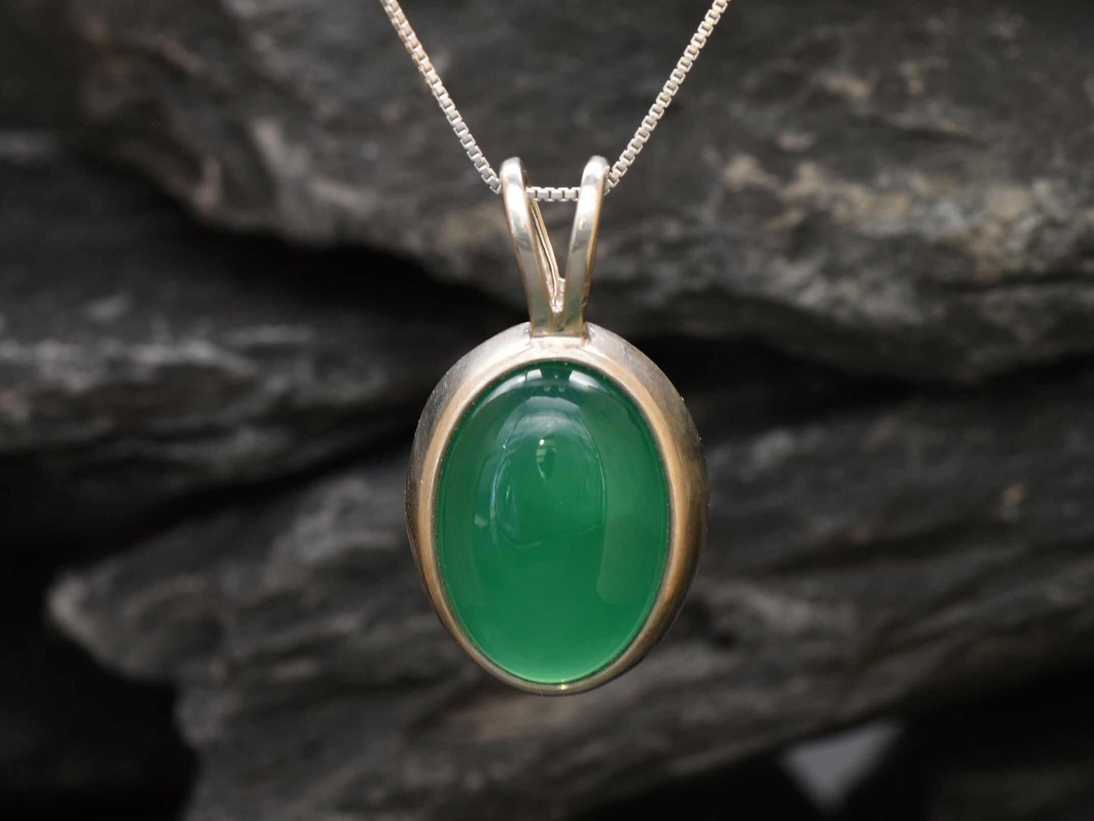 Elegant 925 Sterling Silver Emerald Pendant with an Oval Created Green Emerald, perfect for everyday wear and special occasions.