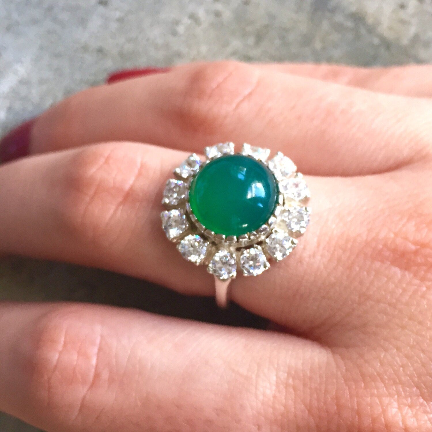 Elegant 925 Sterling Silver ring featuring a round Created Emerald in a stunning halo, perfect for May birthdays.