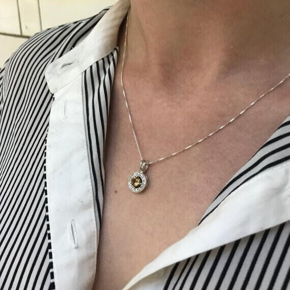 Created Emerald Pendant in 925 Sterling Silver, featuring a round green emerald, ideal for everyday wear and special occasions.