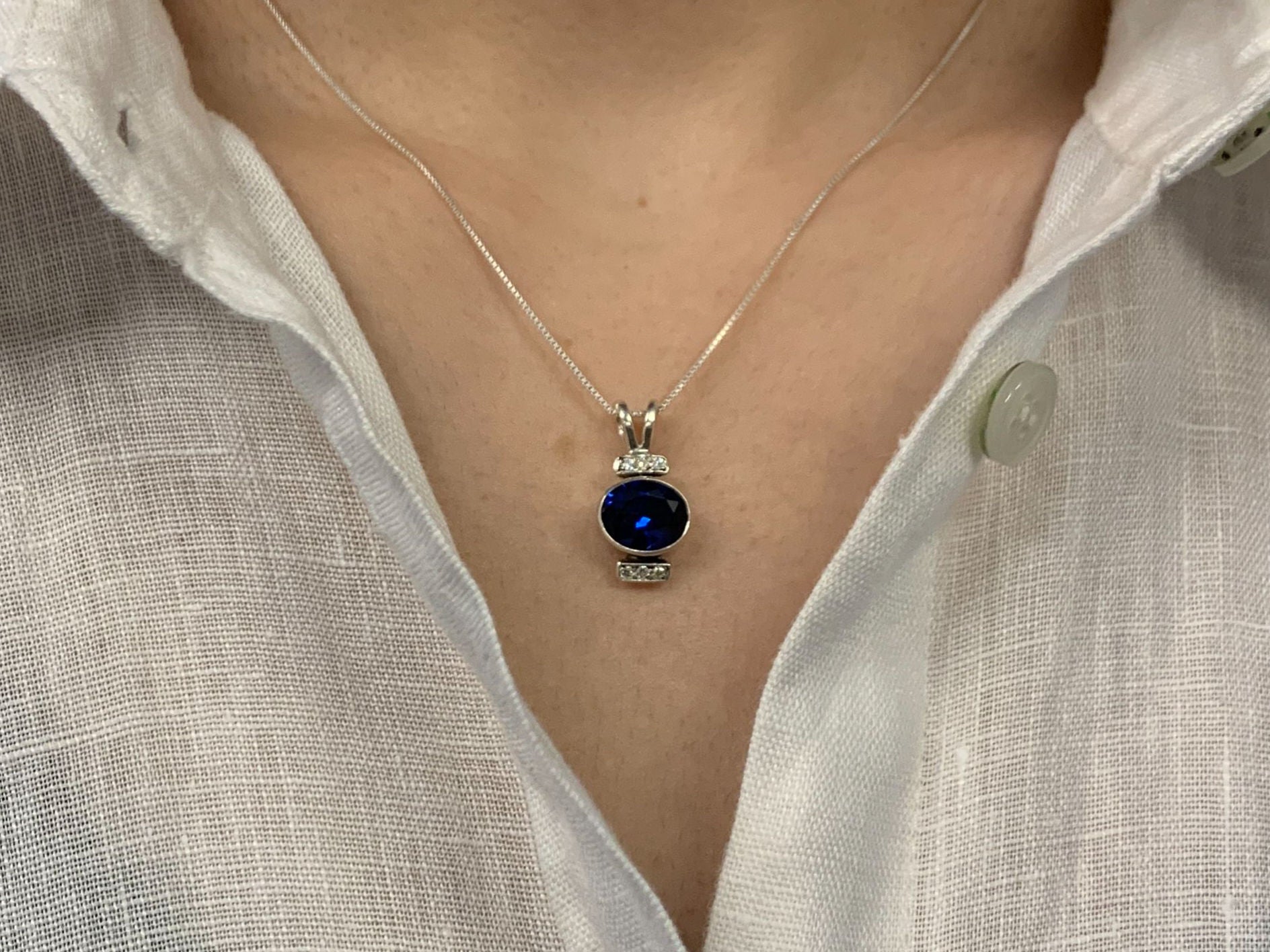Sapphire Pendant in 925 Sterling Silver, Oval Created Blue Sapphire, elegant birthstone gift for September birthdays.