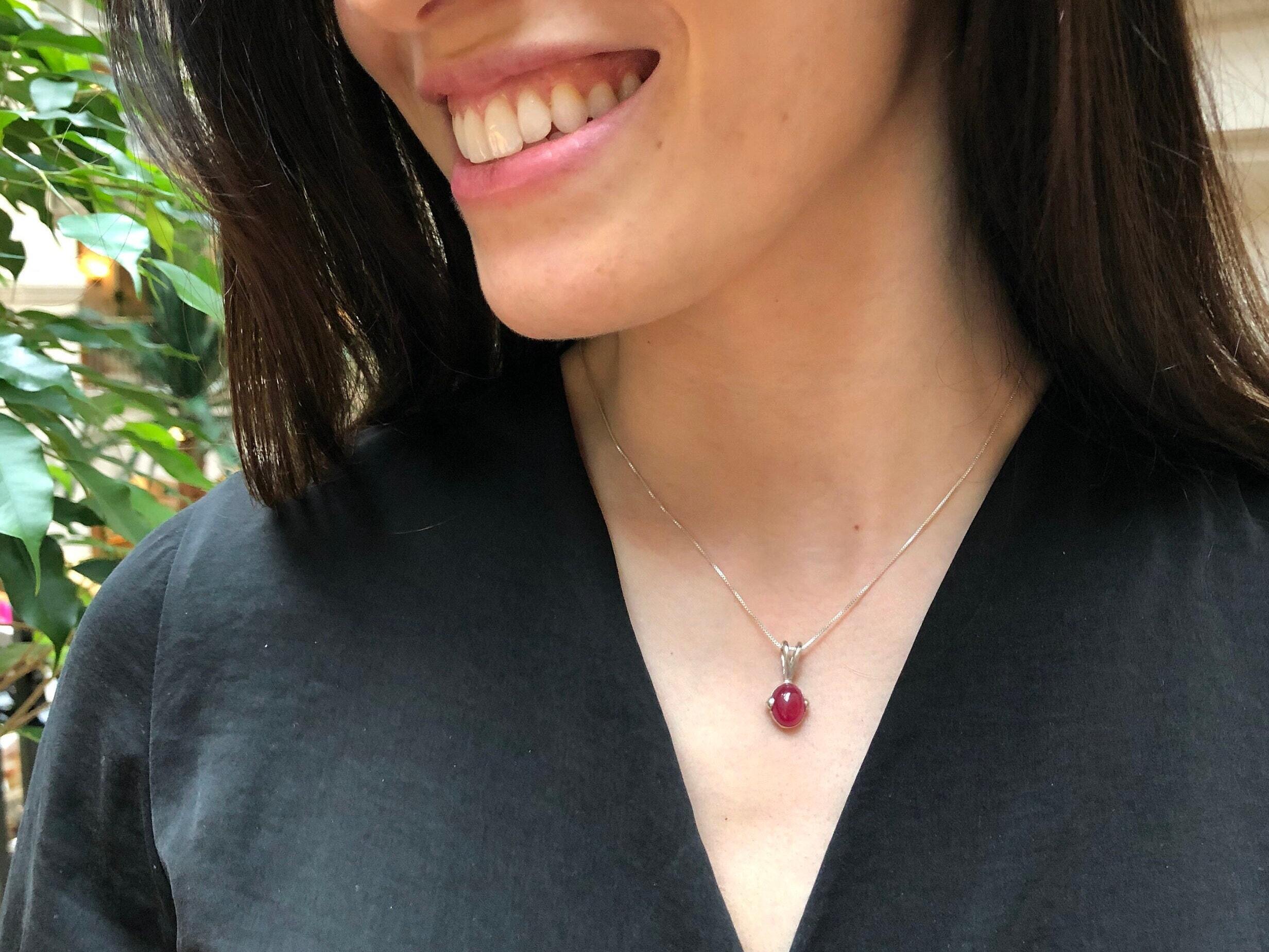 Elegant 925 Sterling Silver Natural Ruby Pendant, featuring an oval red ruby, perfect for July birthdays and special occasions.