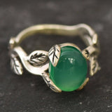 Stylish 925 Sterling Silver ring showcasing an oval Created Green Emerald, a meaningful gift for May birthdays and special moments.