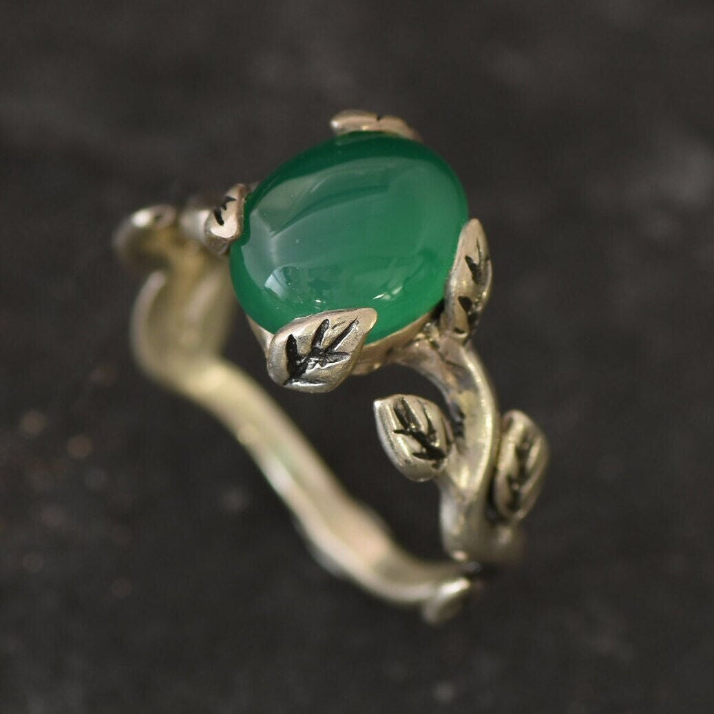 925 Sterling Silver ring adorned with an oval Created Green Emerald, a timeless May birthstone gift for any occasion.