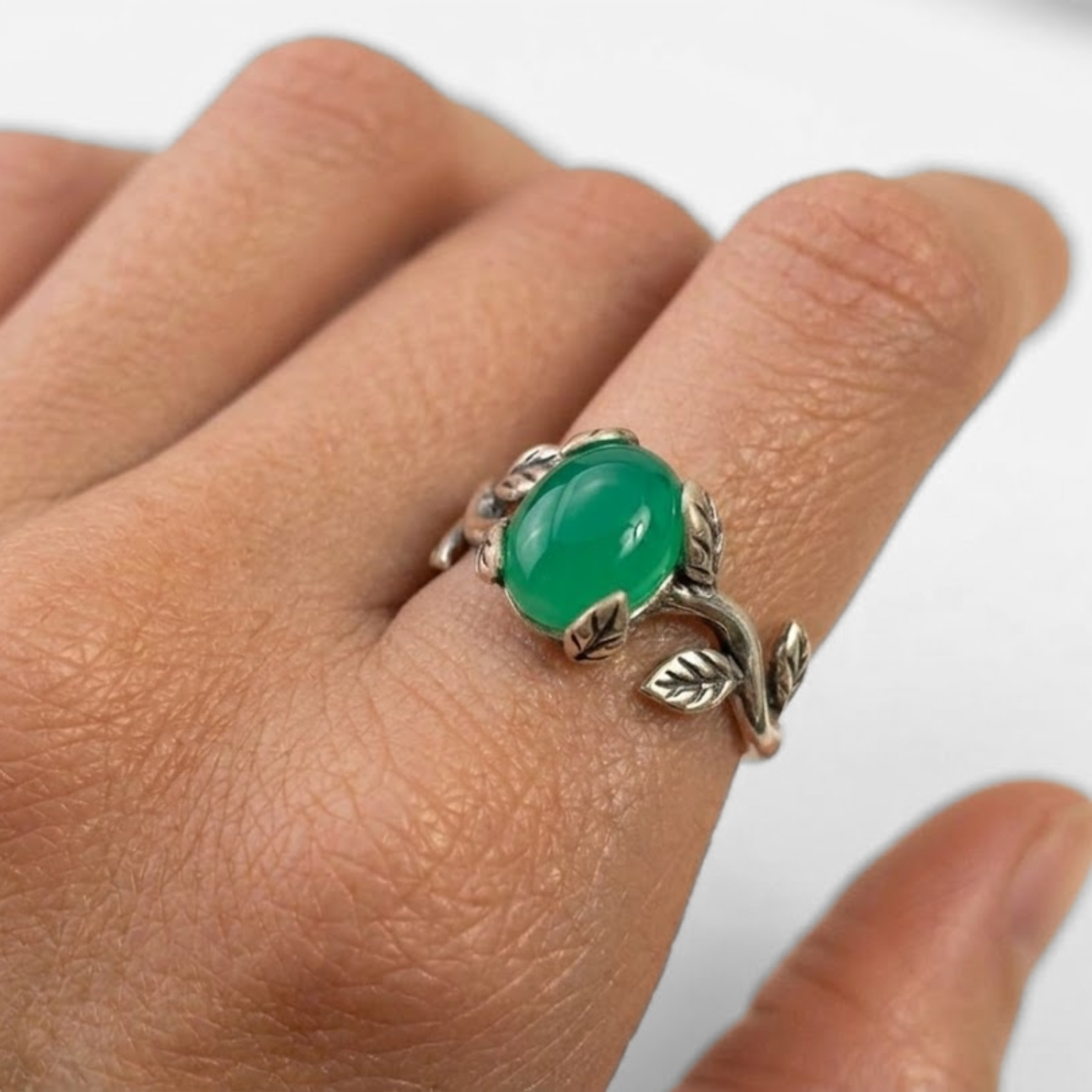 Elegant 925 Sterling Silver ring featuring an oval Created Green Emerald, perfect for birthdays and special occasions.