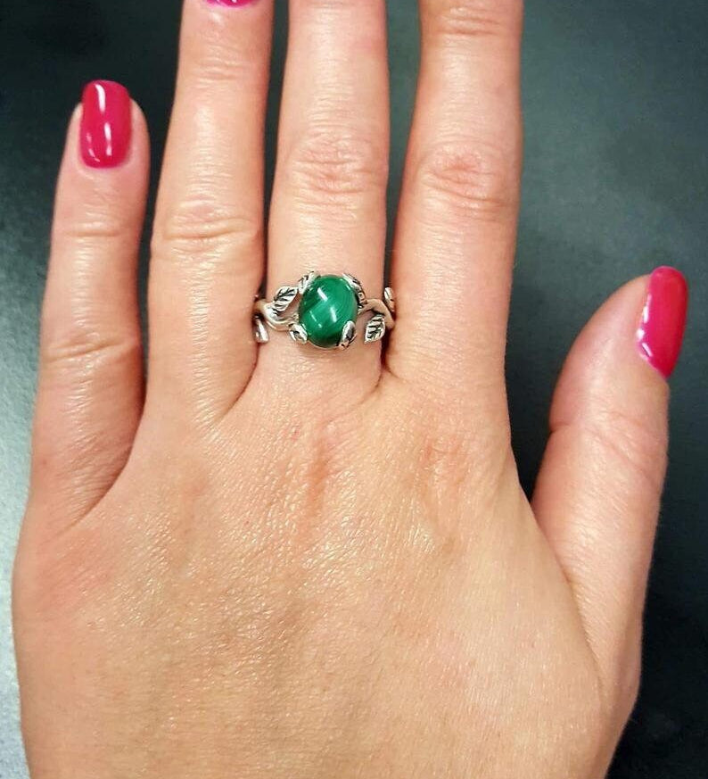 Elegant 925 Sterling Silver ring featuring an oval Created Green Emerald, perfect for birthdays and special occasions.
