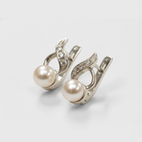 Chic 925 Sterling Silver Pearl Earrings set in Bezel, perfect for daily wear and celebrating June birthdays with elegance.