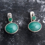 Natural Emerald Earrings made in 925 Sterling Silver with Oval Natural Green Emerald in Bezel setting, May Birthstone gift idea, symbolizes growth, harmony, and deep emotional healing, ideal for everyday wear and perfect for birthday gifting and special occasions.