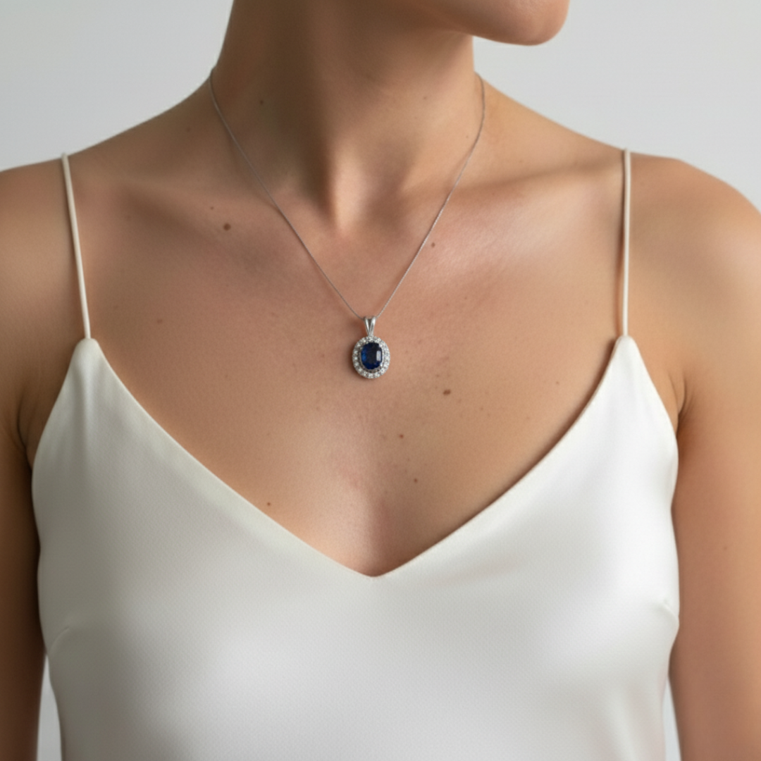 Elegant created sapphire pendant in 925 sterling silver, perfect for adding a touch of sophistication to any outfit.