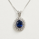 Created Sapphire Pendant made in 925 Sterling Silver with Oval Created Blue Sapphire in Halo setting, September Birthstone gift idea, symbolizes sincerity, truth, and faithfulness, ideal for everyday wear and perfect for birthday gifting and special occasions.