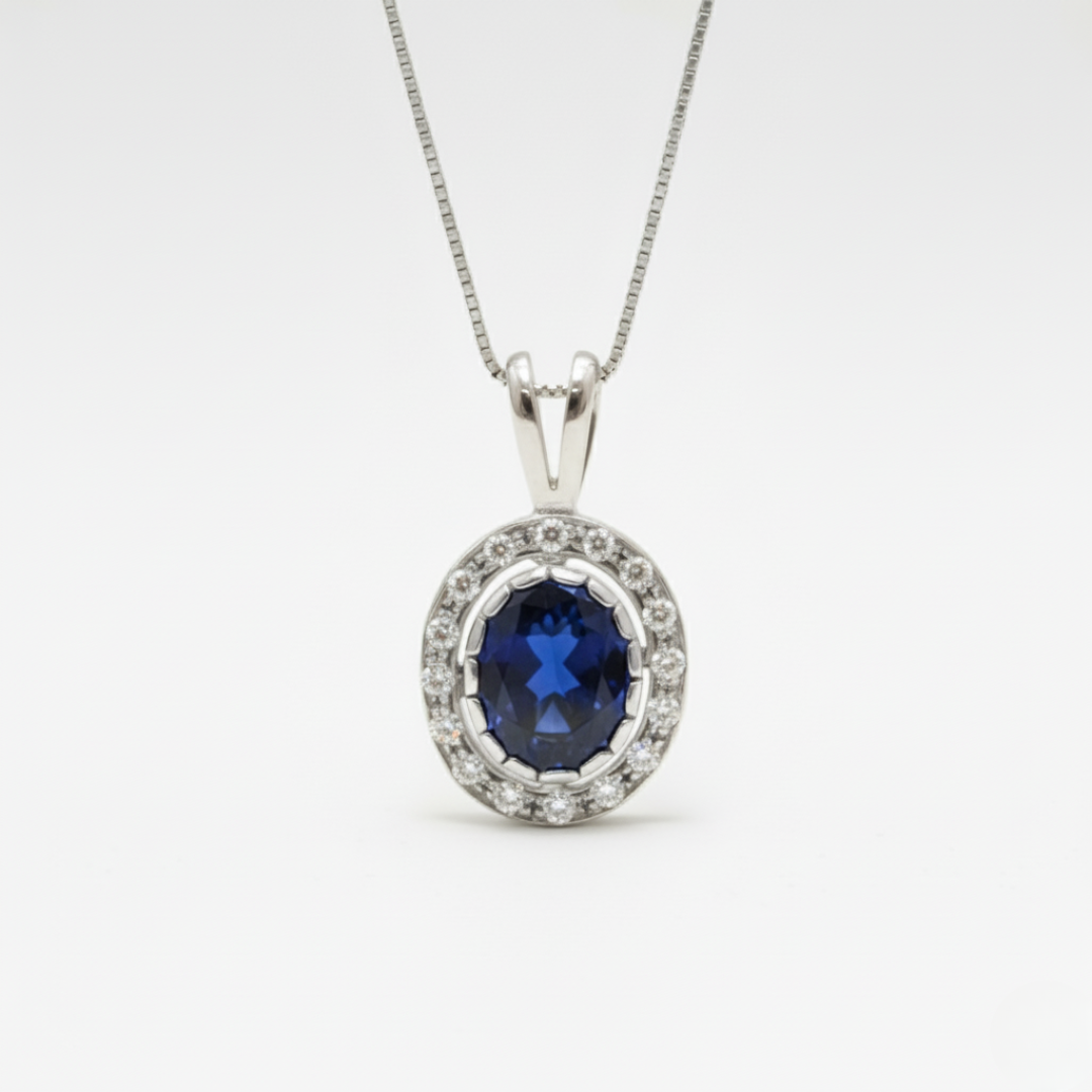 Created Sapphire Pendant made in 925 Sterling Silver with Oval Created Blue Sapphire in Halo setting, September Birthstone gift idea, symbolizes sincerity, truth, and faithfulness, ideal for everyday wear and perfect for birthday gifting and special occasions.