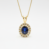 Created Sapphire Pendant made in 18k Gold Vermeil with Oval Created Blue Sapphire in Halo setting, September Birthstone gift idea, symbolizes sincerity, truth, and faithfulness, ideal for everyday wear and perfect for birthday gifting and special occasions.