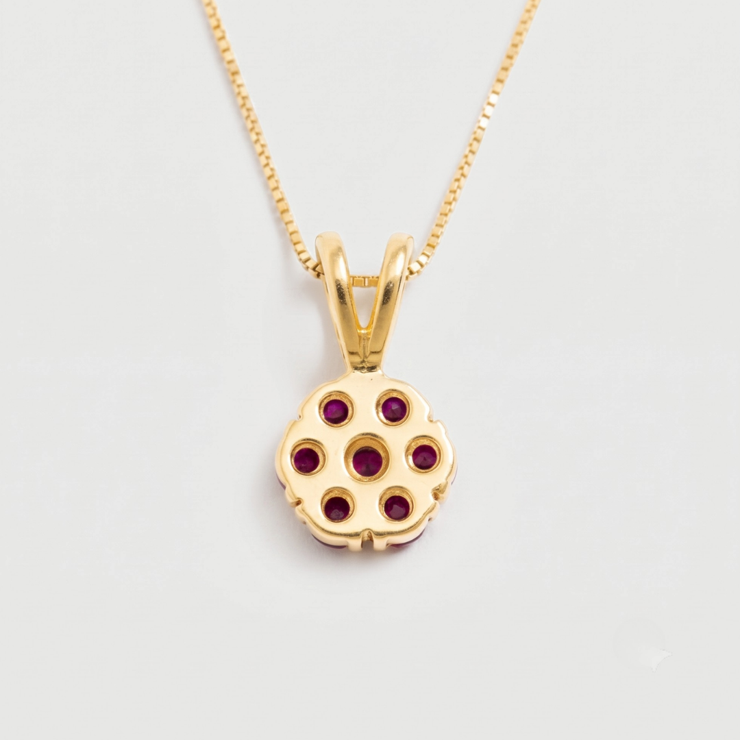 Charming 18k Gold Vermeil Pendant showcasing a cluster of natural red rubies, ideal for special occasions and everyday elegance.