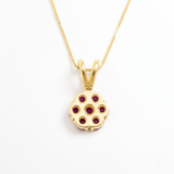 Stylish 18k Gold Vermeil Pendant featuring natural red rubies, perfect for daily wear and meaningful birthday celebrations.