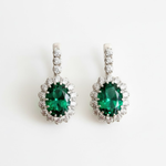 Created Emerald Earrings made in 925 Sterling Silver with Oval Created Green Emerald in Halo setting, May Birthstone gift idea, symbolizes, ideal for everyday wear and perfect for birthday gifting and special occasions.
