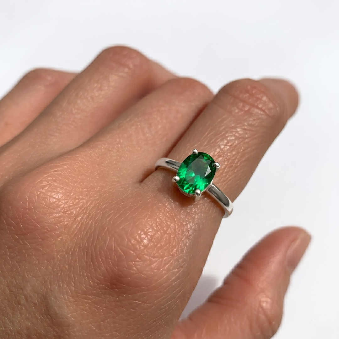 Elegant 925 Sterling Silver ring featuring an Oval Created Green Emerald, perfect for May birthdays and special occasions.