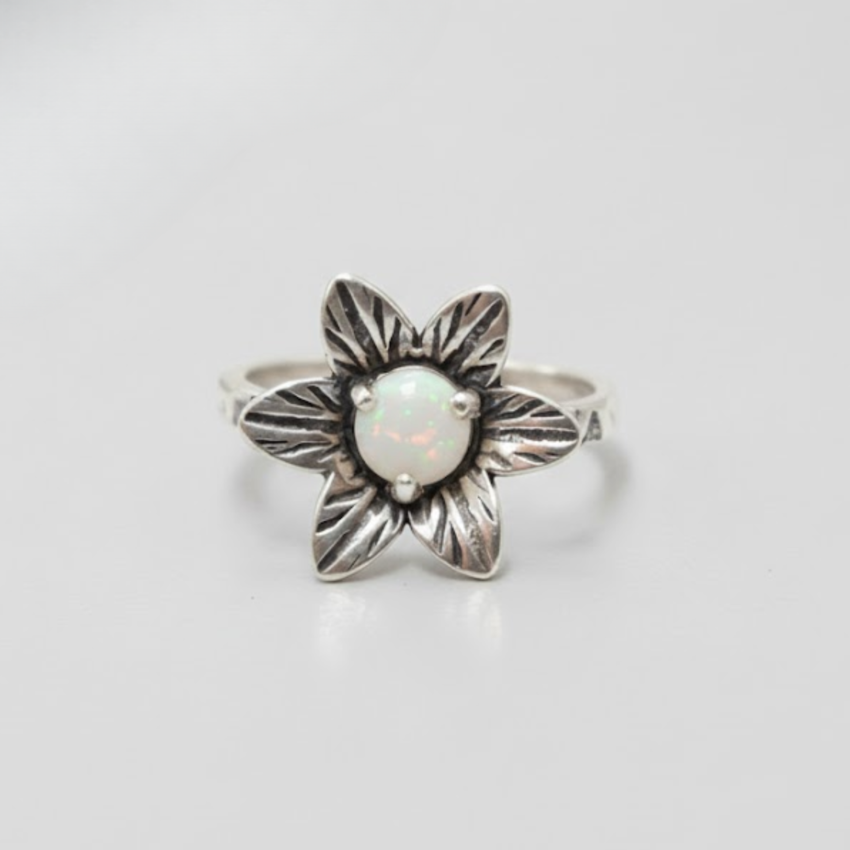 Stunning 925 Sterling Silver ring with round Natural Australian Opal, a perfect symbol of purity for everyday elegance and special occasions.