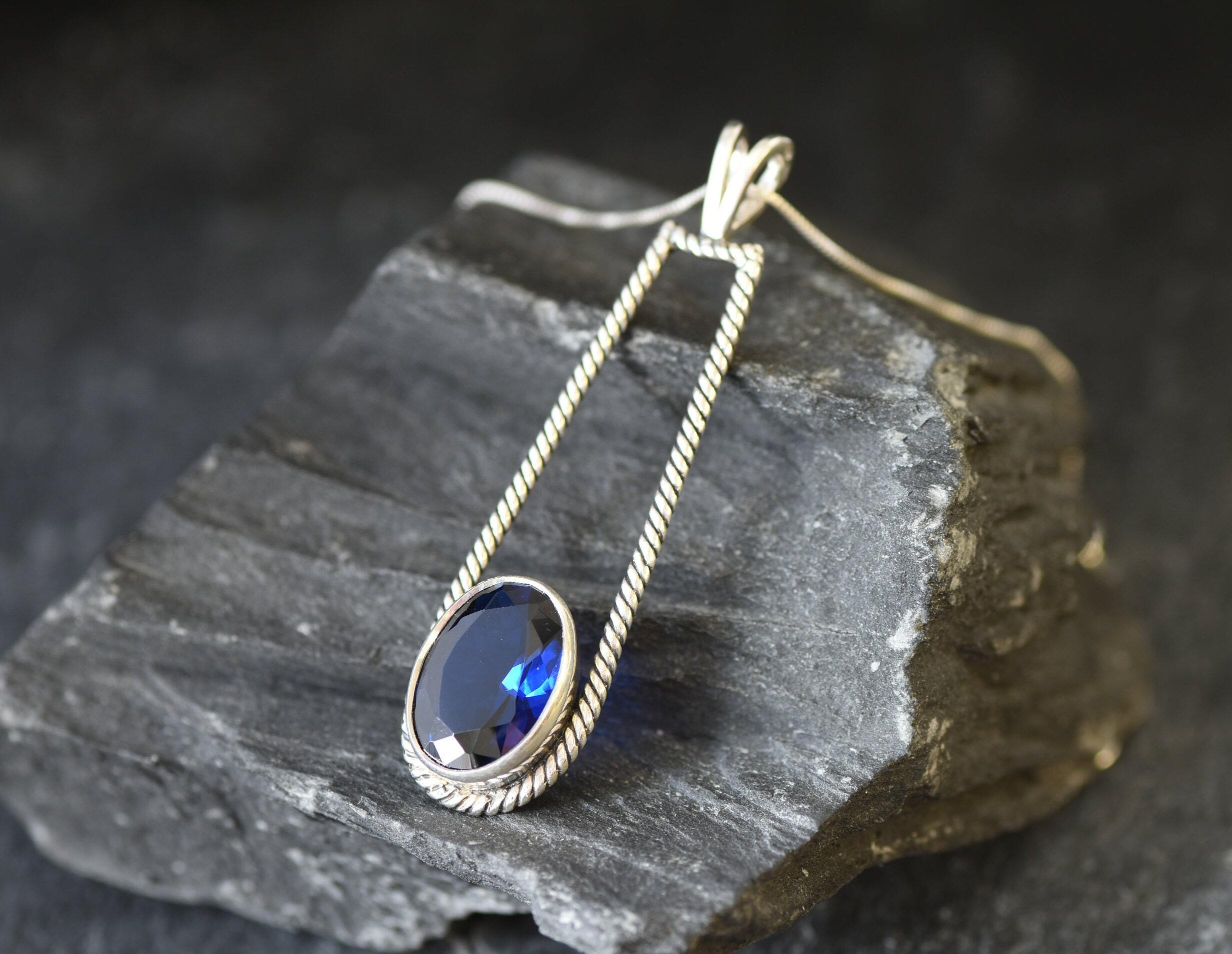 Created Sapphire Pendant made in 925 Sterling Silver with Oval Created Blue Sapphire in Bezel setting, September Birthstone gift idea, symbolizes sincerity, truth, and faithfulness, ideal for everyday wear and perfect for birthday gifting and special occasions.