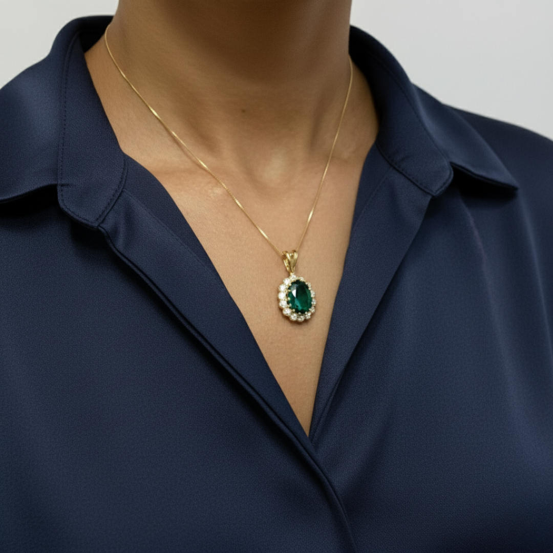 Elegant 18k gold vermeil emerald pendant with halo setting, perfect for May birthdays and special occasions.
