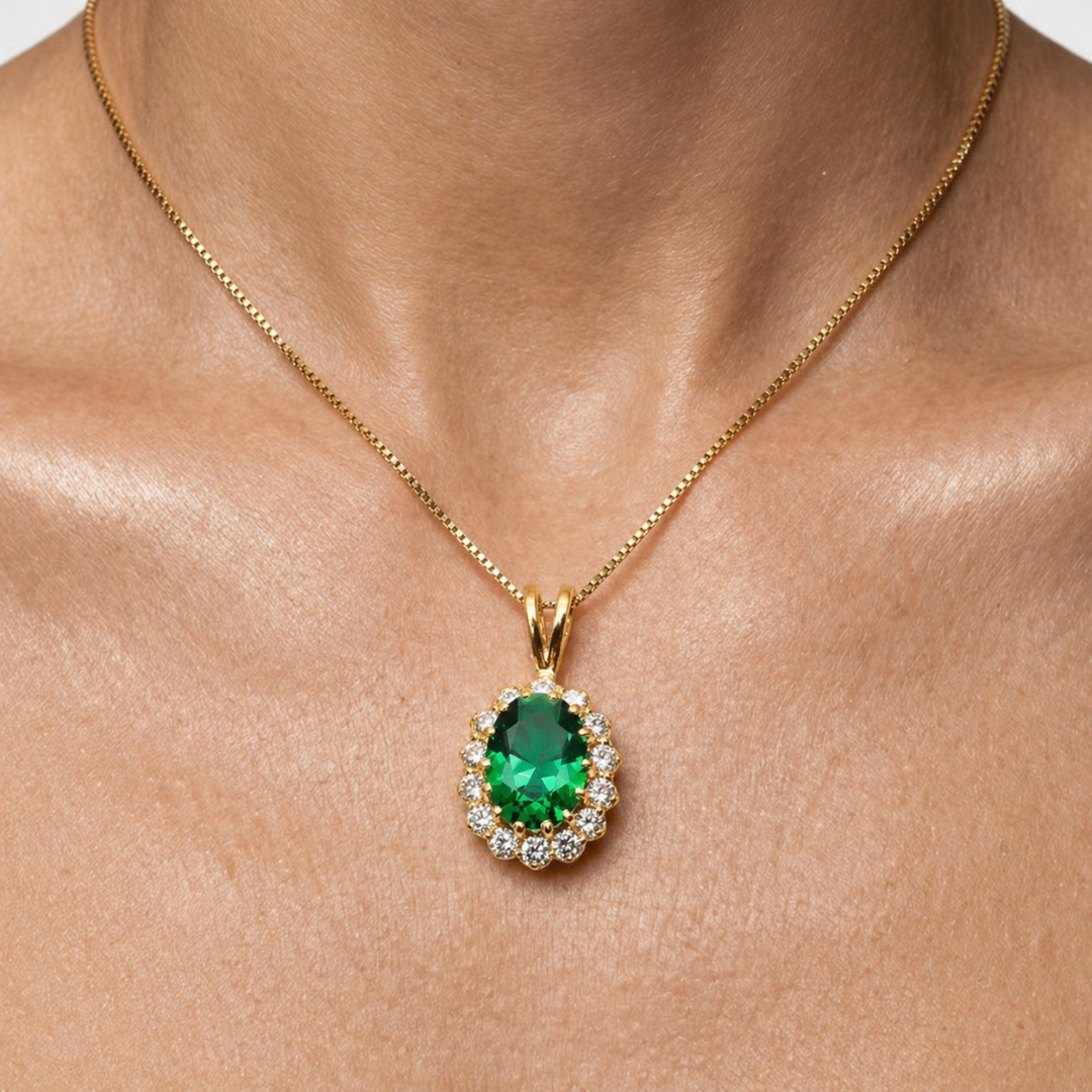 Elegant 18k gold vermeil emerald pendant with halo setting, perfect for May birthdays and special occasions.