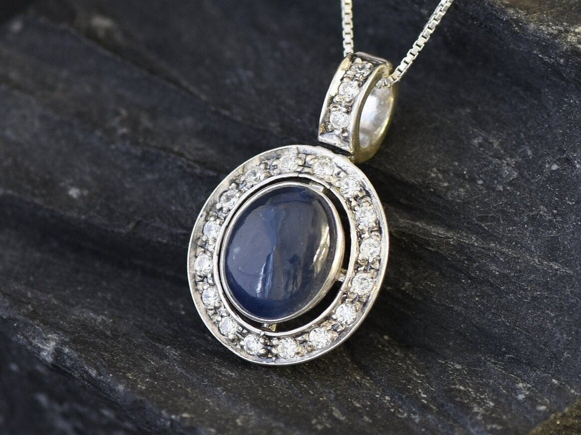 Natural Sapphire Pendant made in 925 Sterling Silver with Oval Natural Blue Sapphire in Bezel setting, September Birthstone gift idea, symbolizes sincerity, truth, and faithfulness, ideal for everyday wear and perfect for birthday gifting and special occasions.