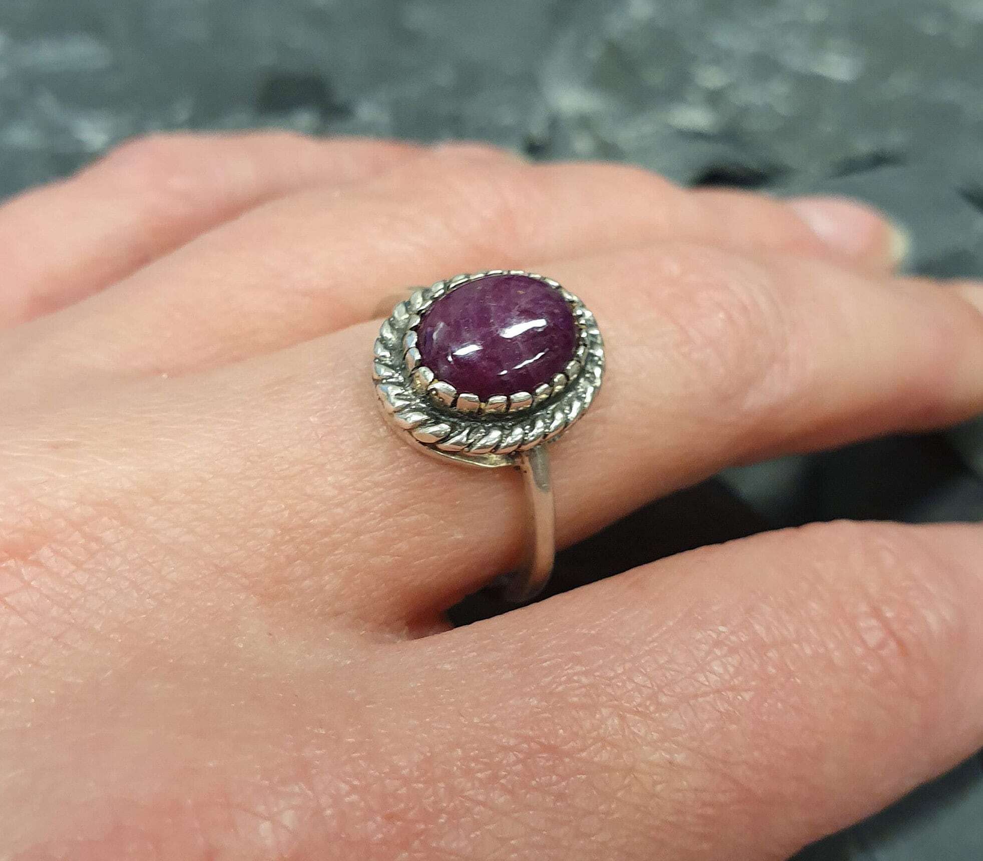 Elegant 925 Sterling Silver ring featuring a stunning oval red ruby, perfect for birthdays and special occasions.
