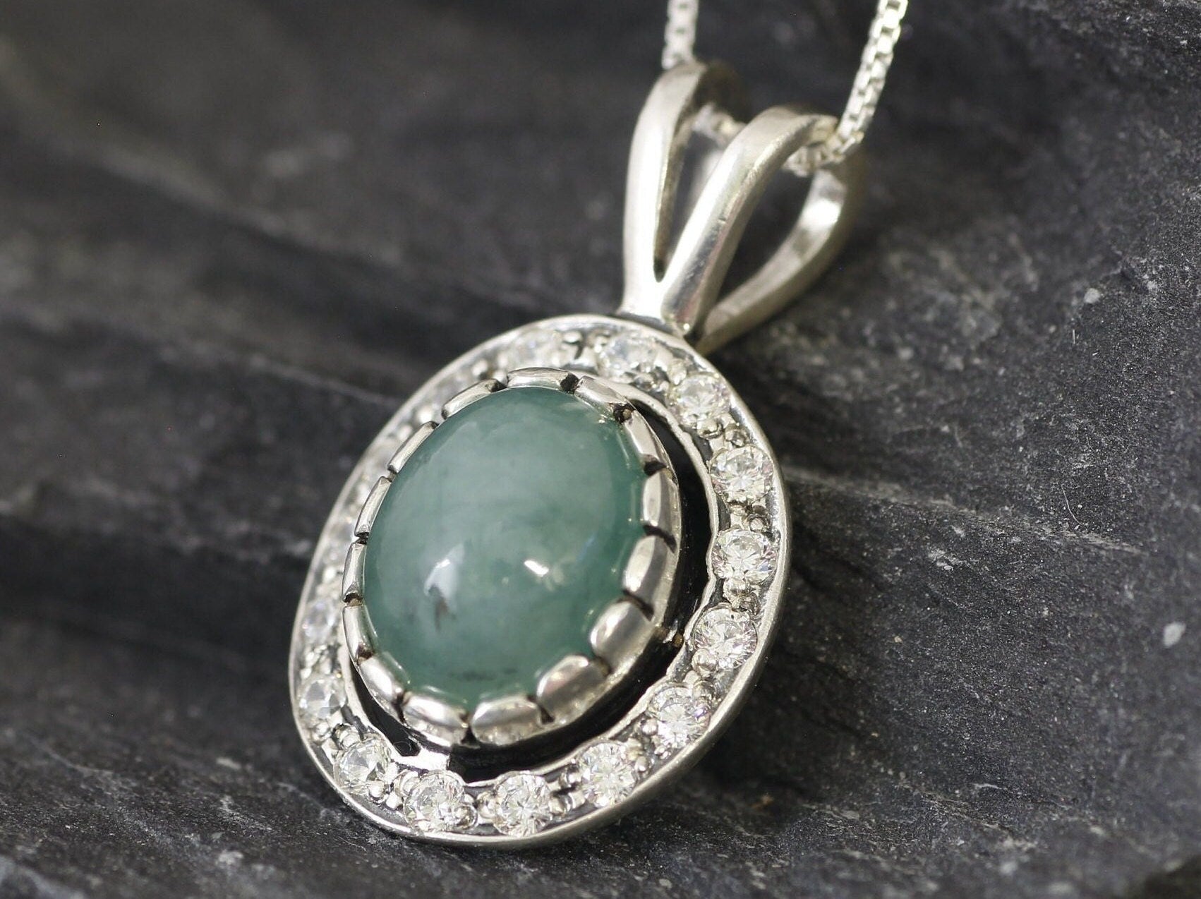 Natural Emerald Pendant made in 925 Sterling Silver with Oval Natural Green Emerald in Halo setting, May Birthstone gift idea, symbolizes growth, harmony, and deep emotional healing, ideal for everyday wear and perfect for birthday gifting and special occasions.