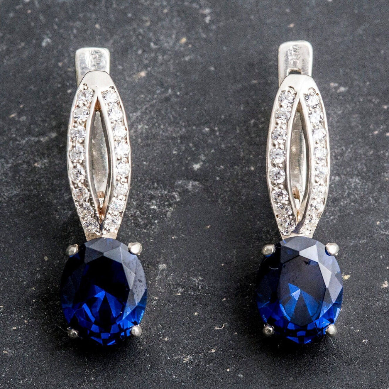 Adina Stone material options for 925 Sterling Silver, 18K Yellow Gold Vermeil, 18K White Gold Vermeil, 18K Rose Gold Vermeil.